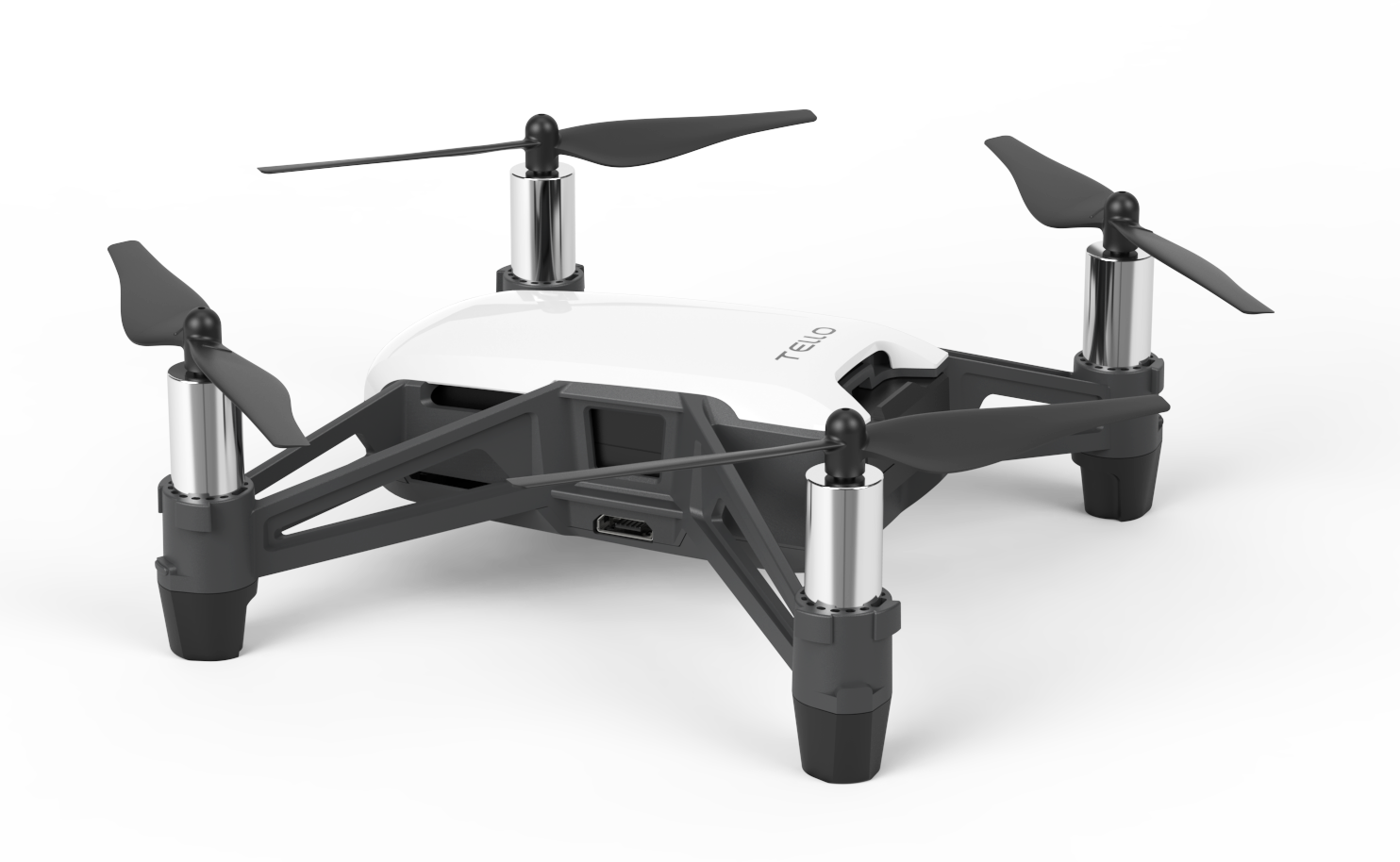 White and black drone with four propellers, Tello printed on top.