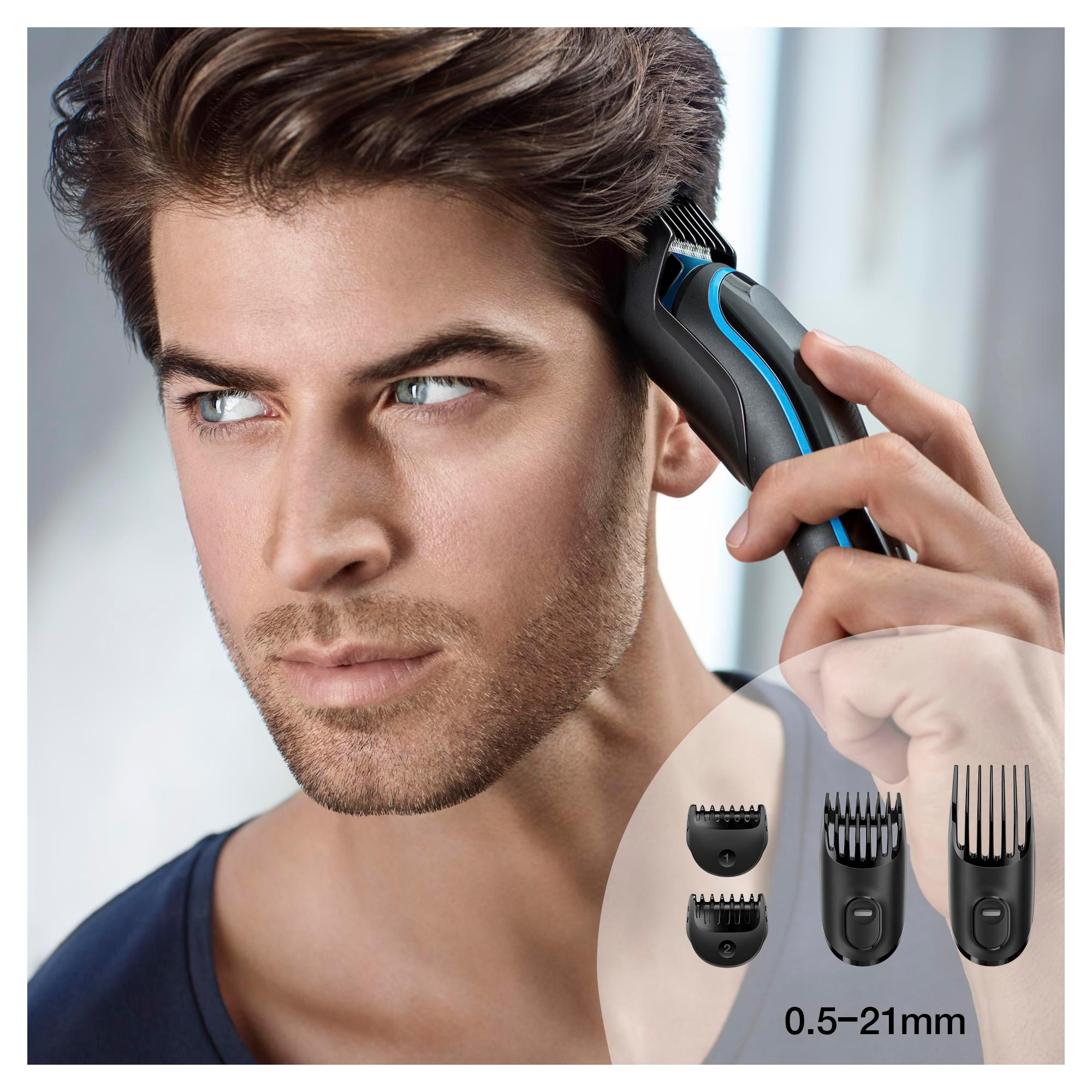 Mann benutzt schwarzen und blauen Trimmer, drei Trimmerköpfe und Messung 0,5-21mm werden gezeigt.