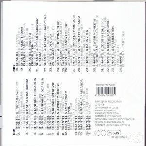 CD-Rückseite. Text mit Songtiteln verschiedener Künstler. Mehrere Logos und Text. Weißer Hintergrund.