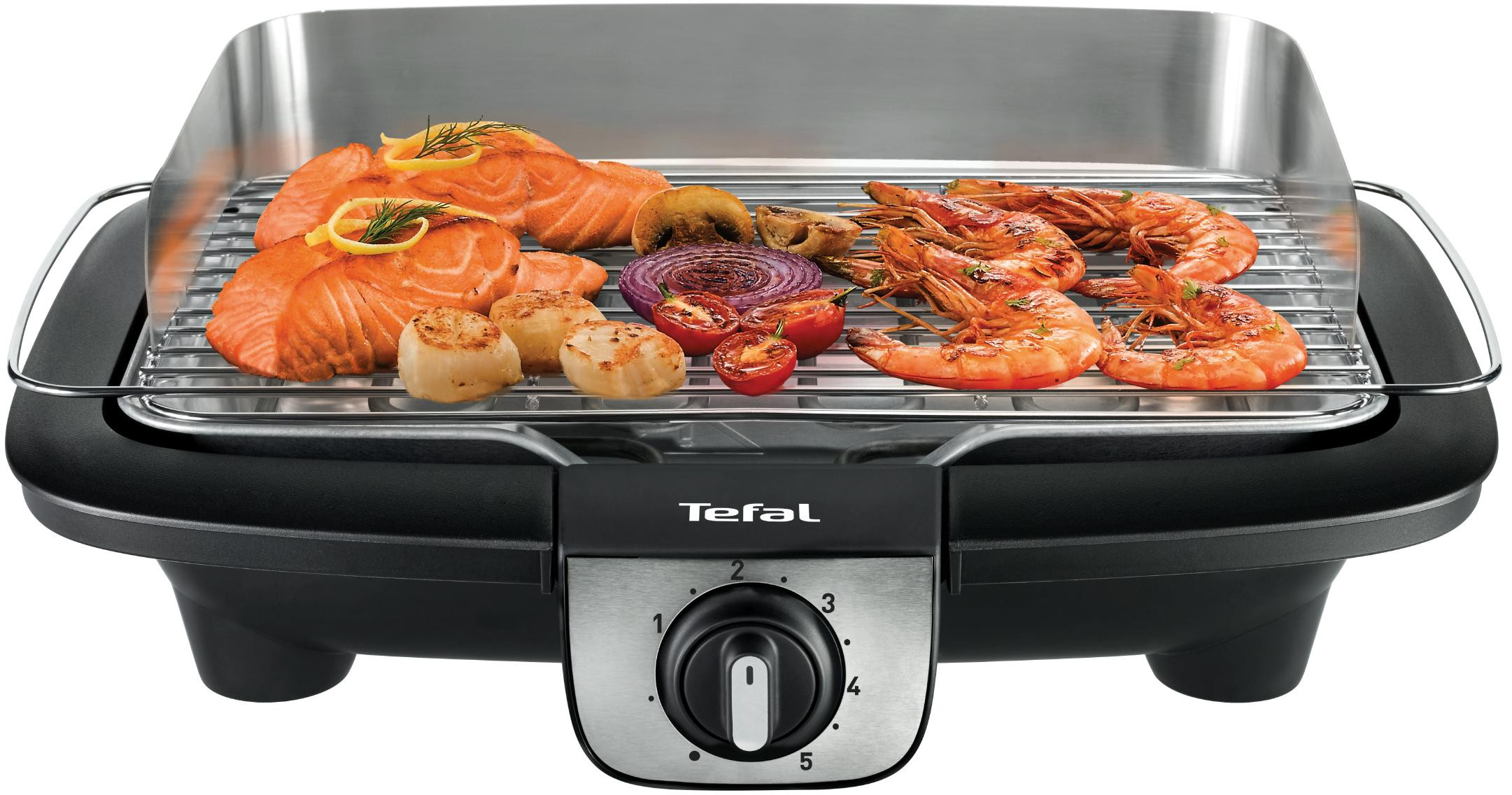 Elektrische grill met zalm, garnalen, sint-jakobsschelpen, tomaten en uien die erop koken.