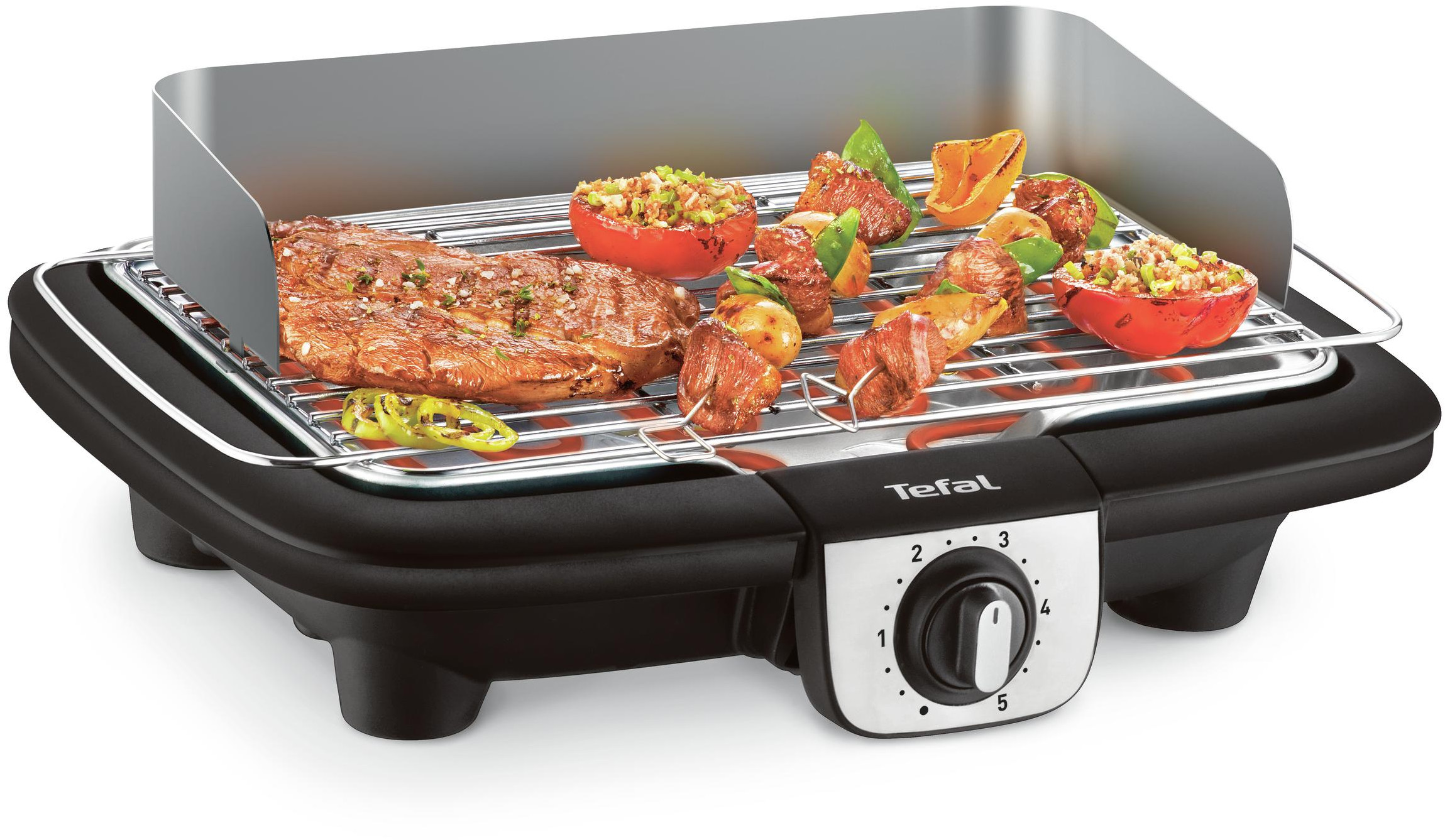 Tefal elektrische grill met verschillende gegrilde gerechten. De knop staat op 3.