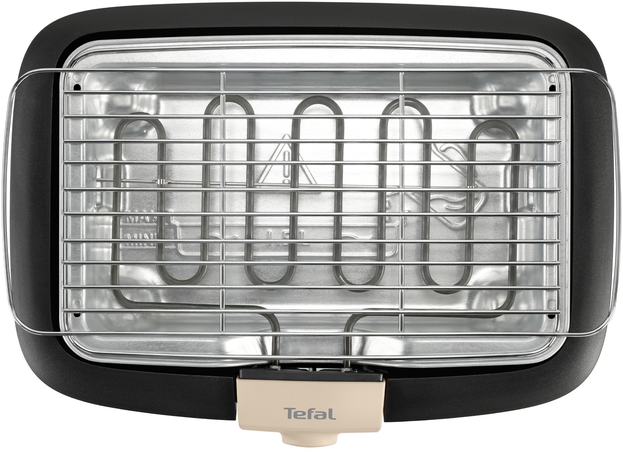 Zwarte Tefal grill met zilveren binnenkant, bovenaanzicht, zwart-witte achtergrond.