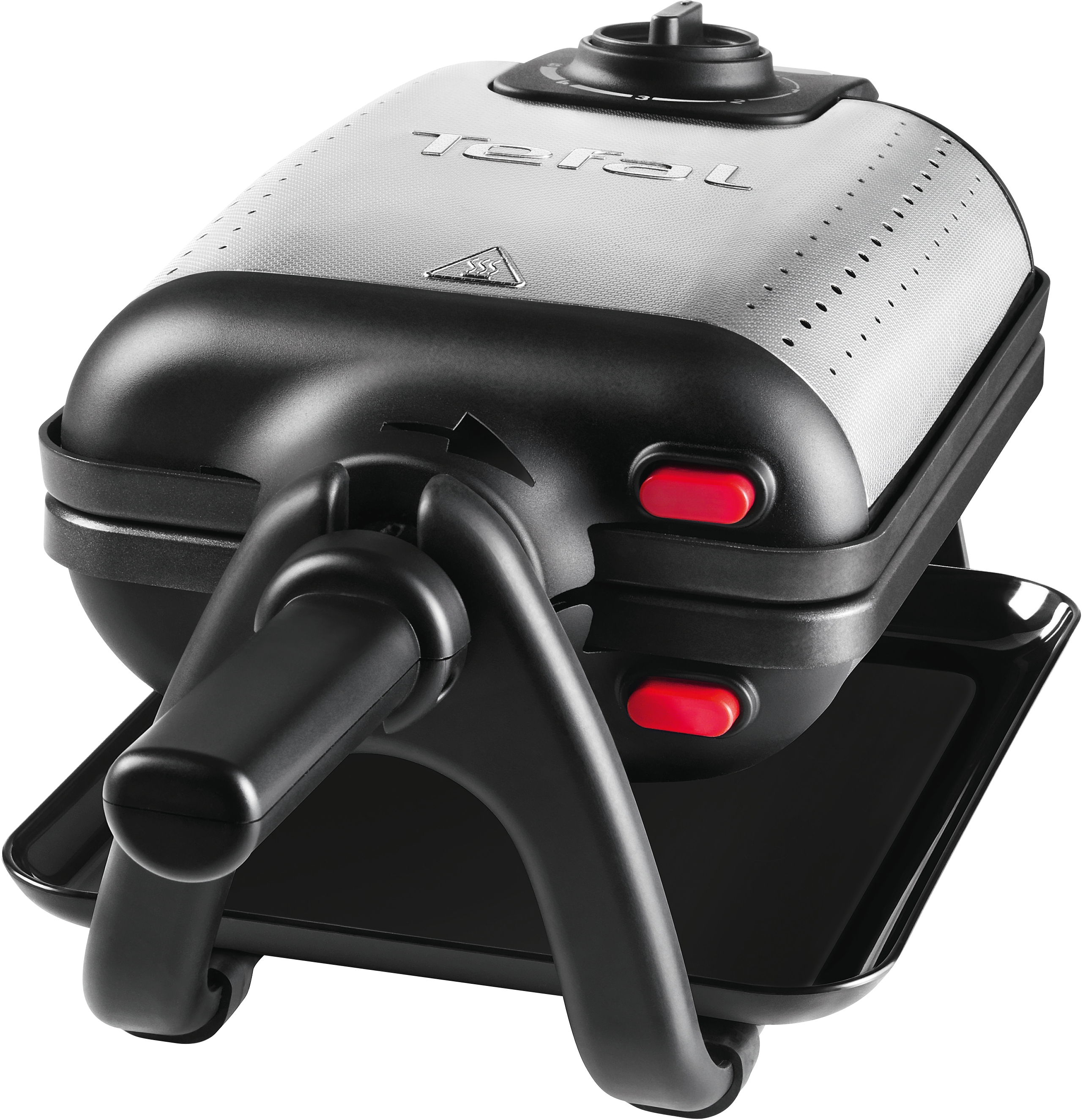 A Tefal waffle maker, black and silver. Features red buttons and a tray. A dial is at the top. On white background.