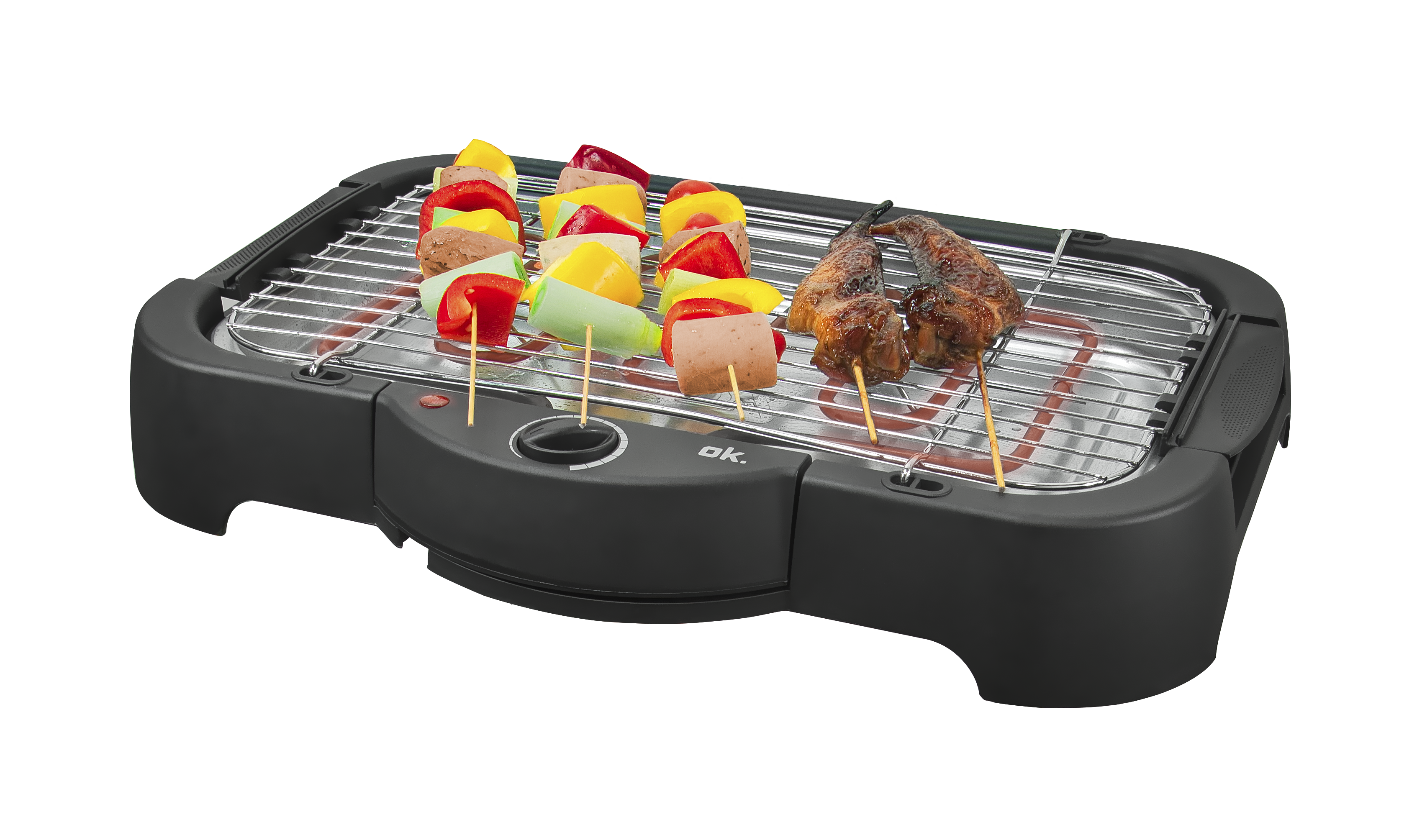 Elektrischer Grill mit Spießen aus Gemüse und Fleisch. Der Grill steht auf einer schwarzen Oberfläche.