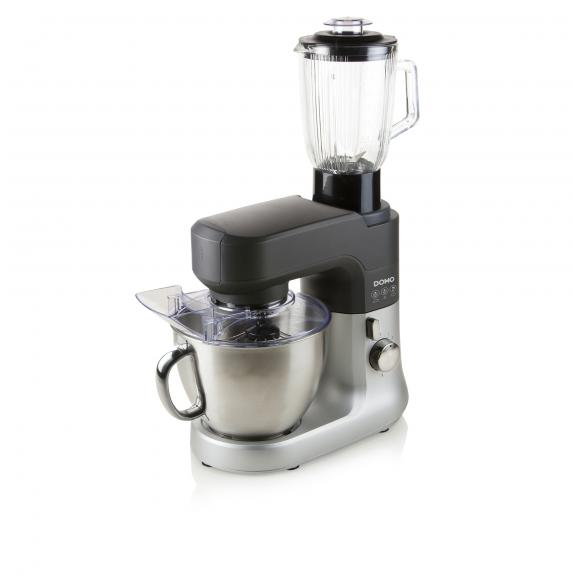 Silver and black kitchen machine with a blender and bowl on white background.