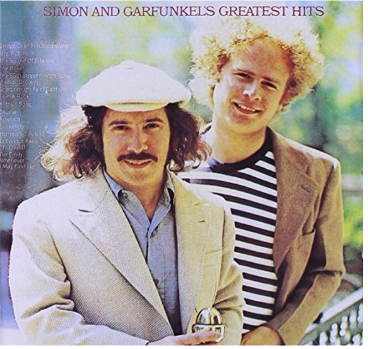 Simon & Garfunkel albumhoes. Twee mannen poseren, één met een pet. Albumtitel bovenaan.