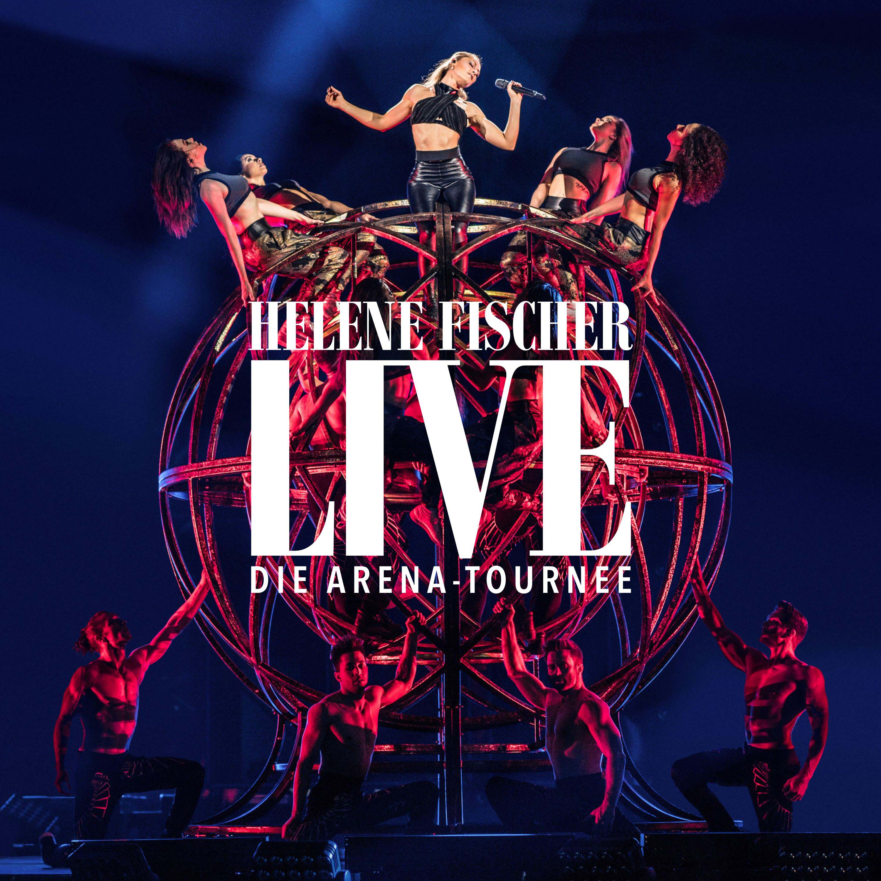 Helene Fischer Live Bühne mit Tänzern und einer großen Metallkugel. Blauer Hintergrund.