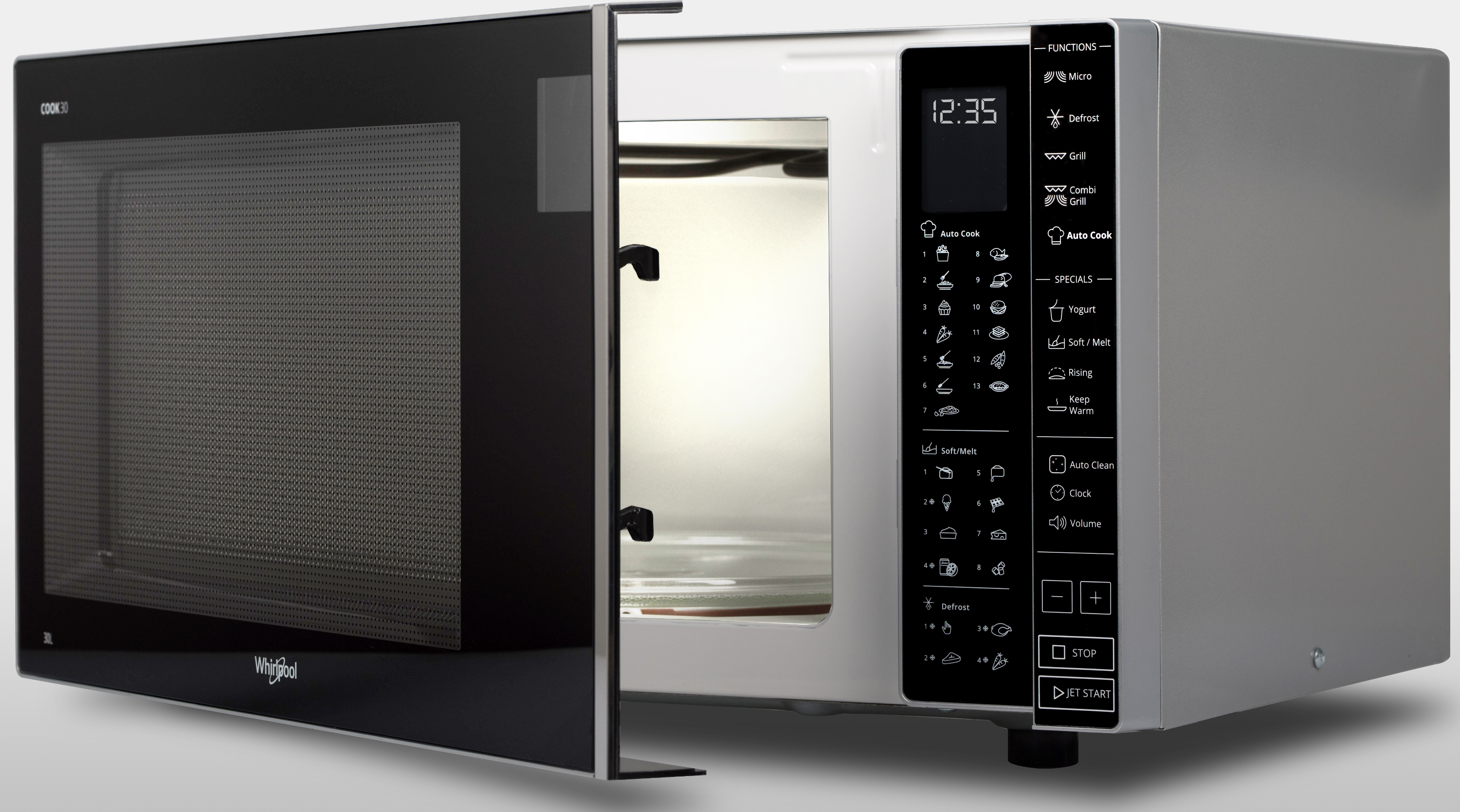 A silver microwave oven with the door open. A digital clock displays time and control buttons are visible.
