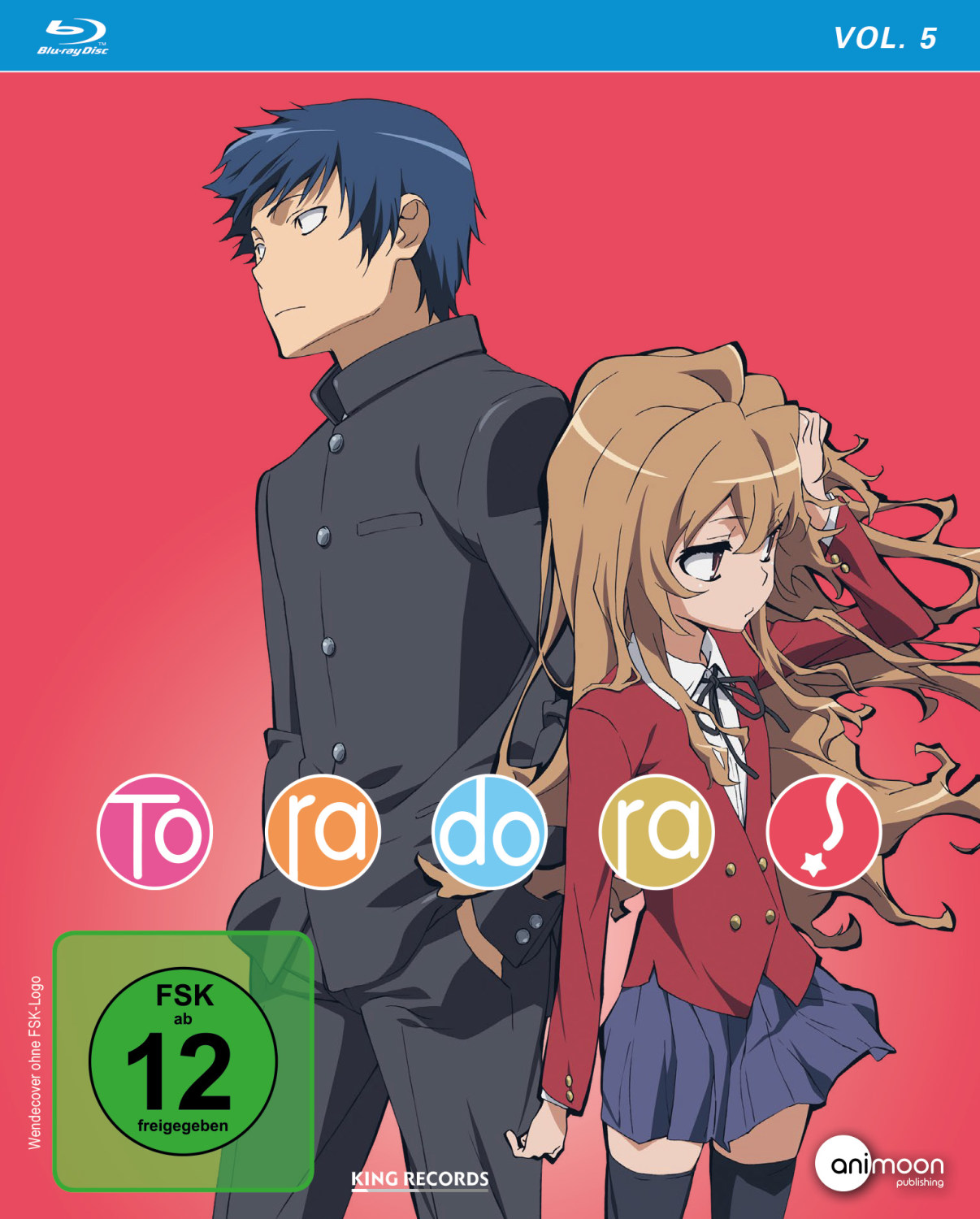 Anime-Cover von "Toradora" Band 5. Ein Junge und ein Mädchen stehen Rücken an Rücken. Das Mädchen trägt eine rote Jacke und einen blauen Rock.