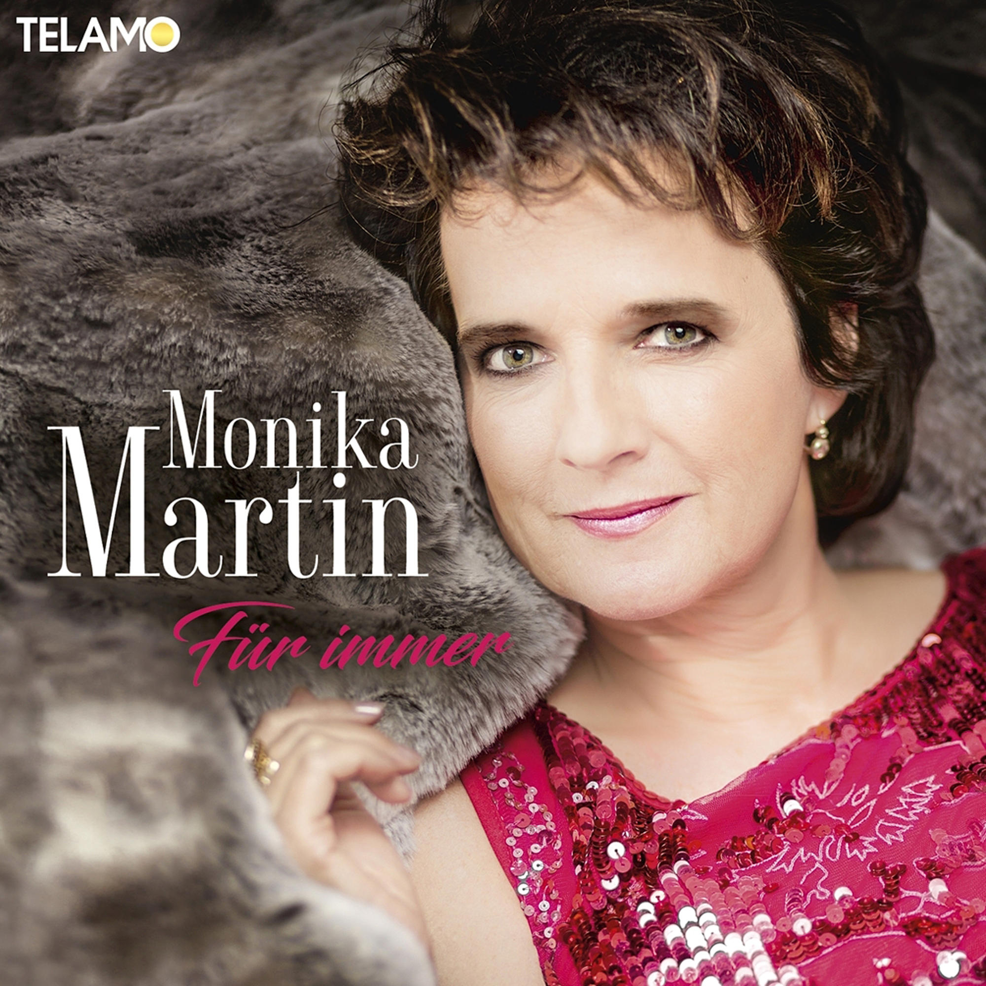 Albumcover mit einer Frau in einem roten Pailletten-Top und Fell, Künstlername 'Monika Martin'.