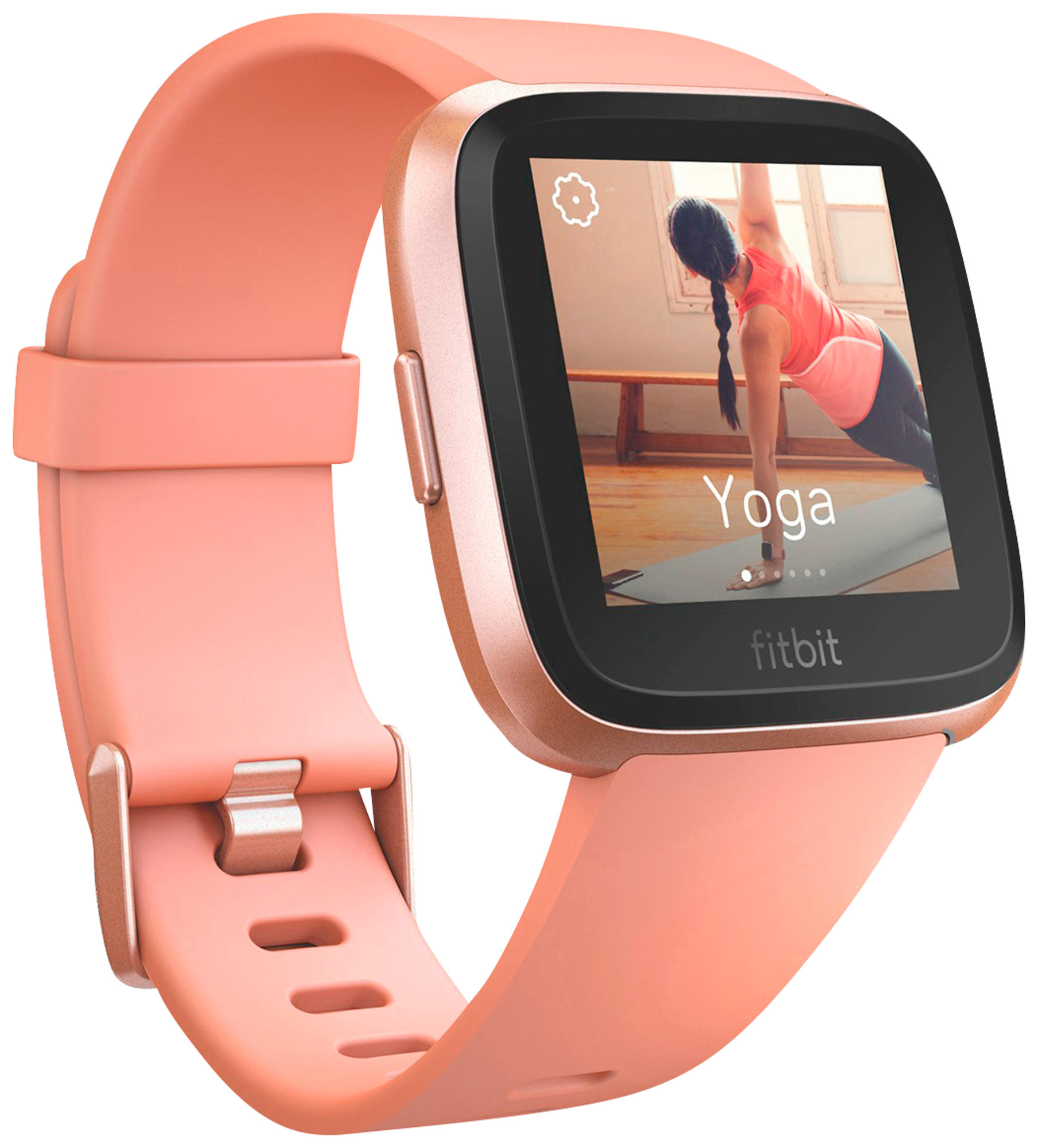 Un reloj inteligente Fitbit rosa que muestra un video de yoga. Correa rosa y pantalla negra. Primer plano.