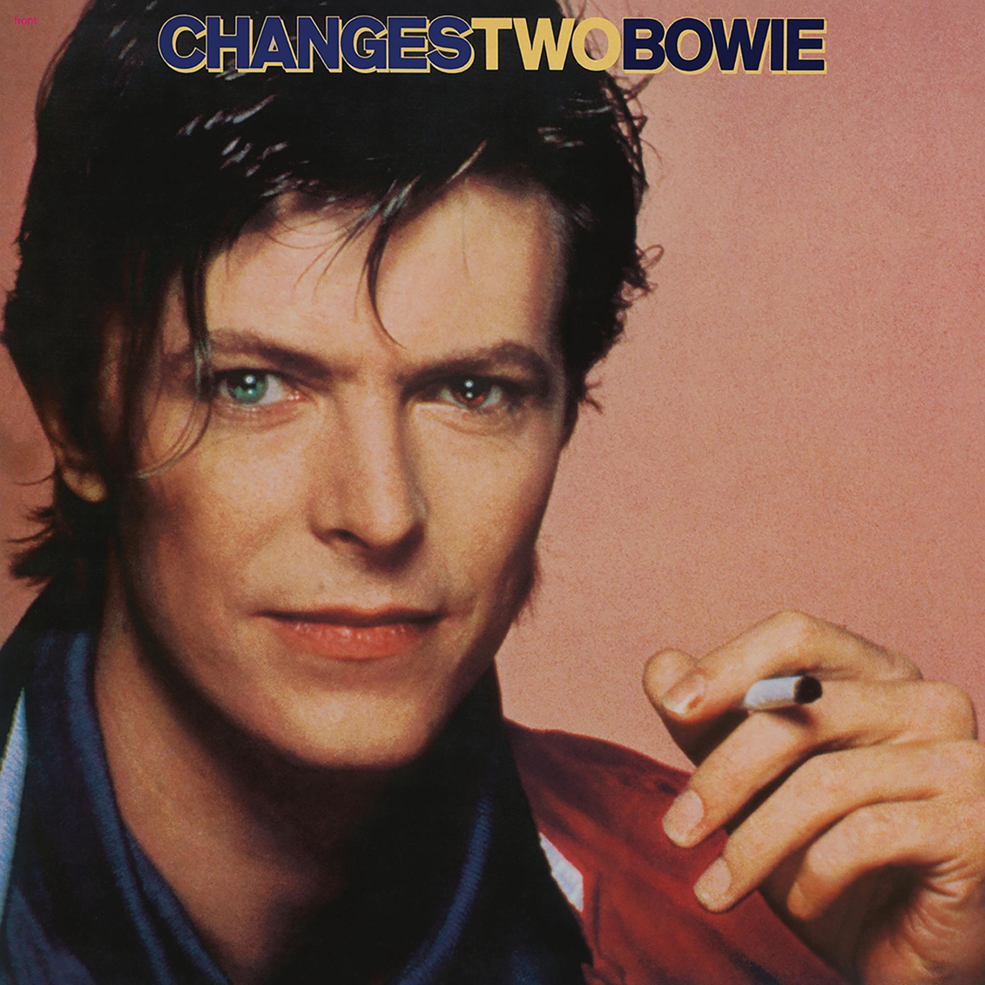 Album cover of David Bowie, titled "CHANGESTWOBOWIE." He has heterochromia and holds a cigarette.