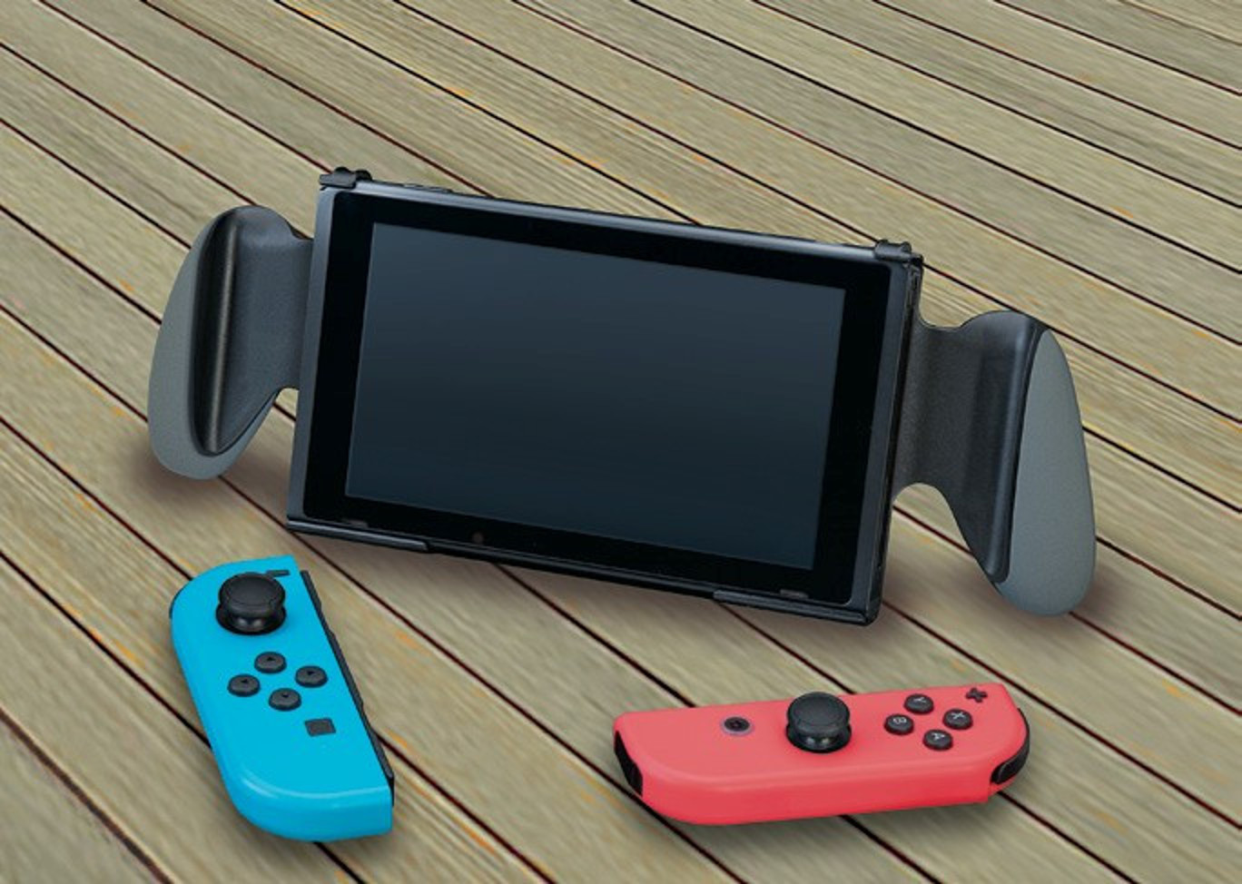 Eine schwarze Nintendo Switch-Konsole mit grauen Griffen und zwei farbigen Controllern, blau und rot.