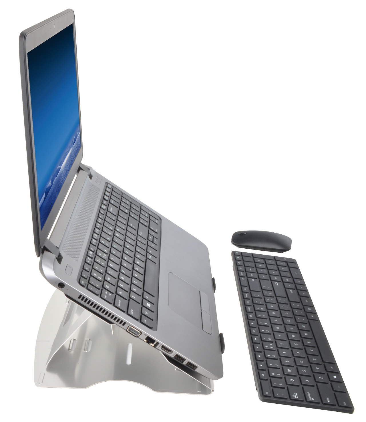 Laptop on stand with keyboard and mouse. Black keyboard, silver laptop, white stand.