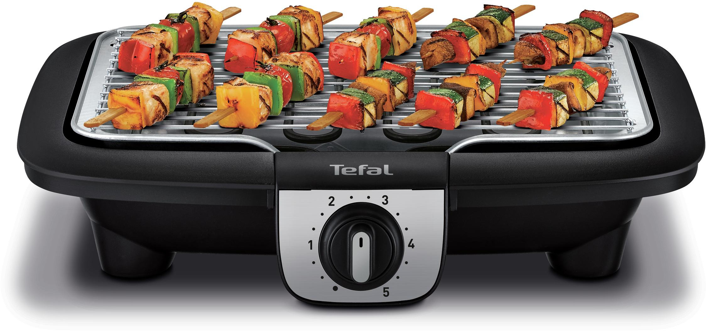 Black electric grill with skewers of grilled vegetables and meat, with a temperature control.