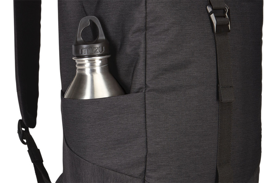 Black backpack with a silver water bottle in side pocket. White background.