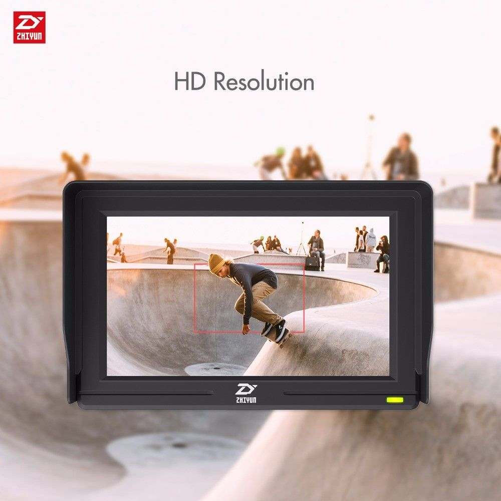 A screen displays a skateboarder in a skatepark. The screen is surrounded by a black frame, with a logo at the bottom.