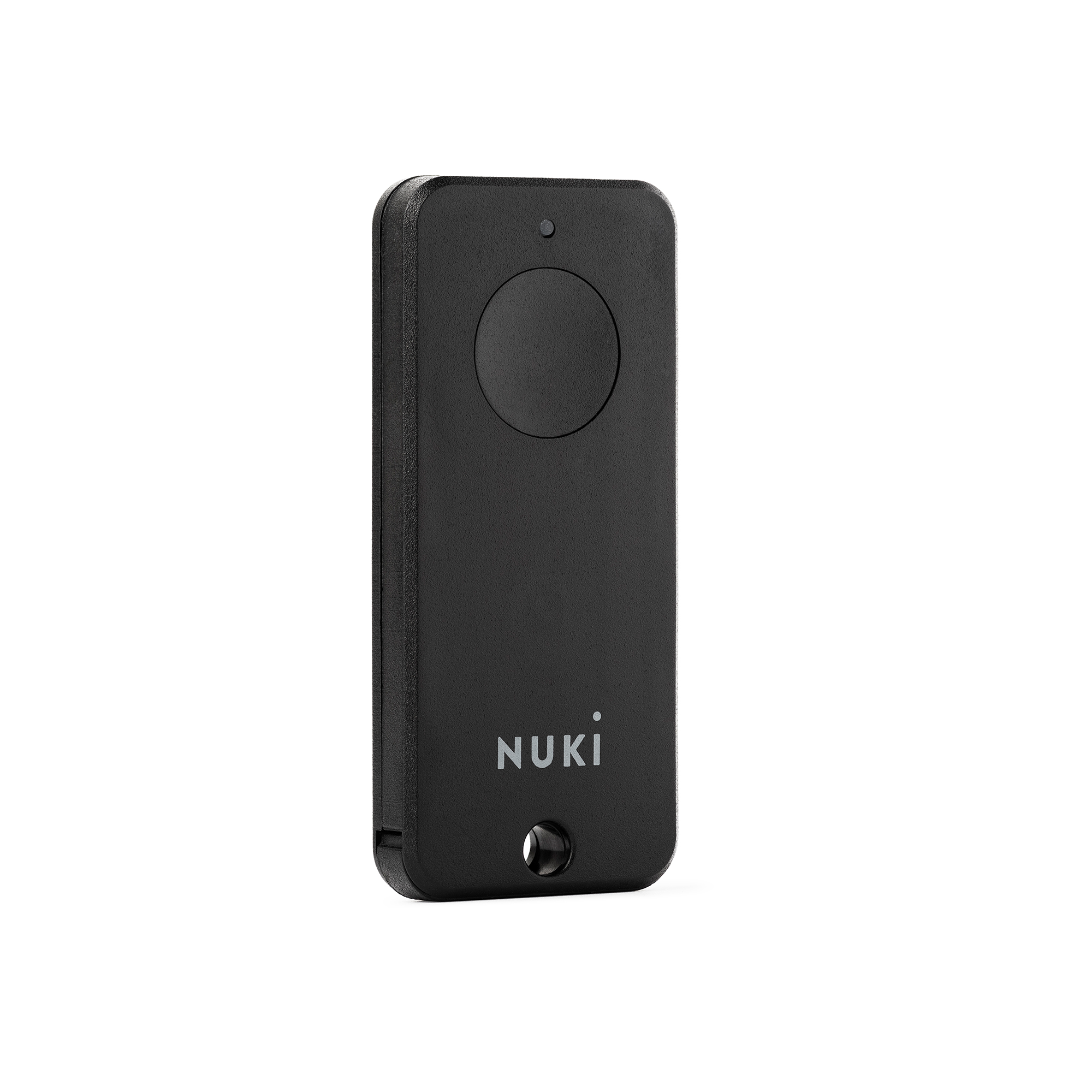 Schwarze NUKI-Fernbedienung mit kreisförmiger Taste und NUKI-Logo unten.