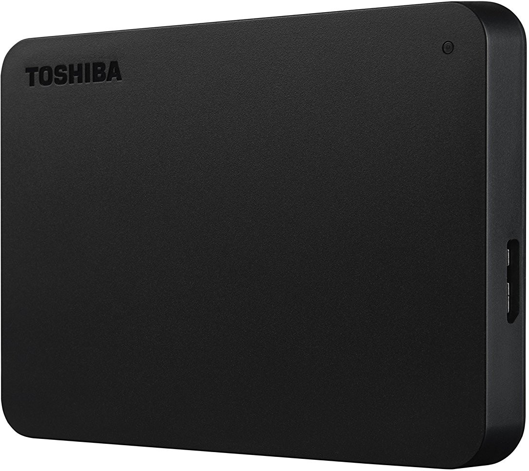 Disque dur externe Toshiba noir. Il possède un port USB et le logo Toshiba.