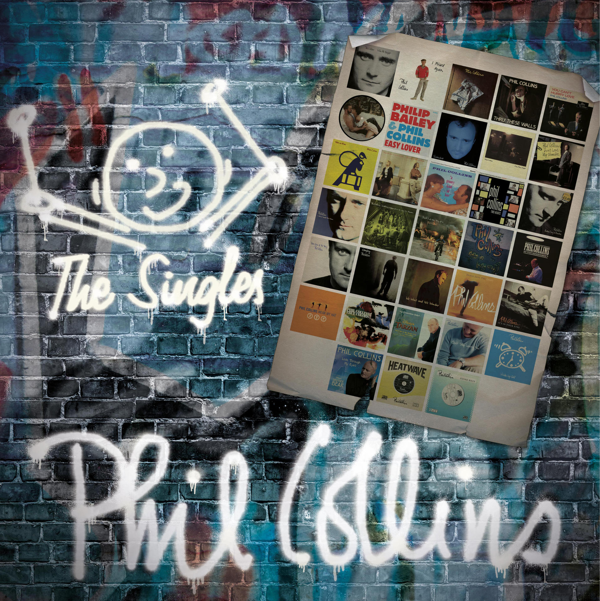 Eine mit Graffiti bedeckte Backsteinmauer mit Albumcover für Phil Collins' 'The Singles'.