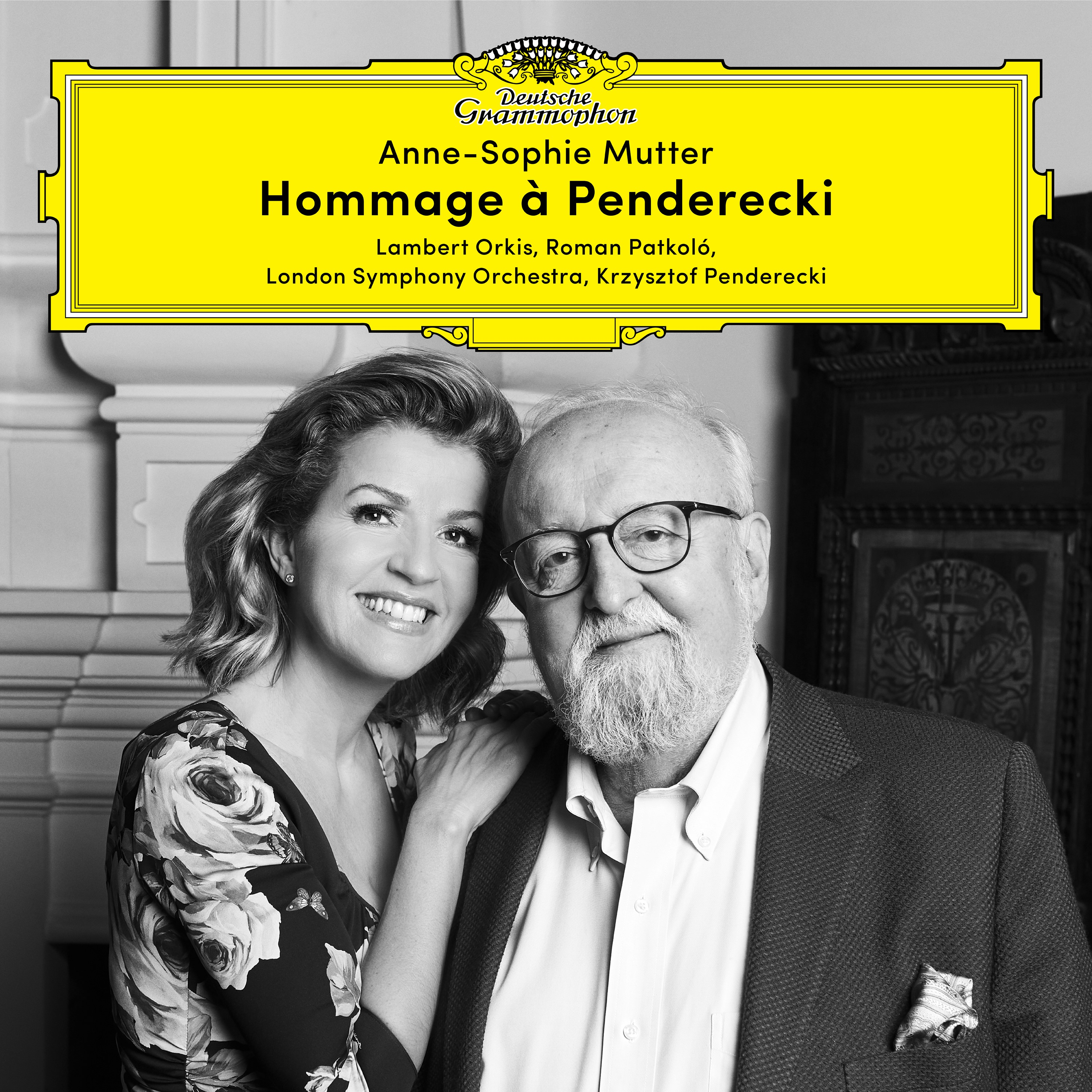 Albumcover mit zwei lächelnden Personen. Sie sind in einem gelben Rahmen. Das Album ist Hommage à Penderecki.