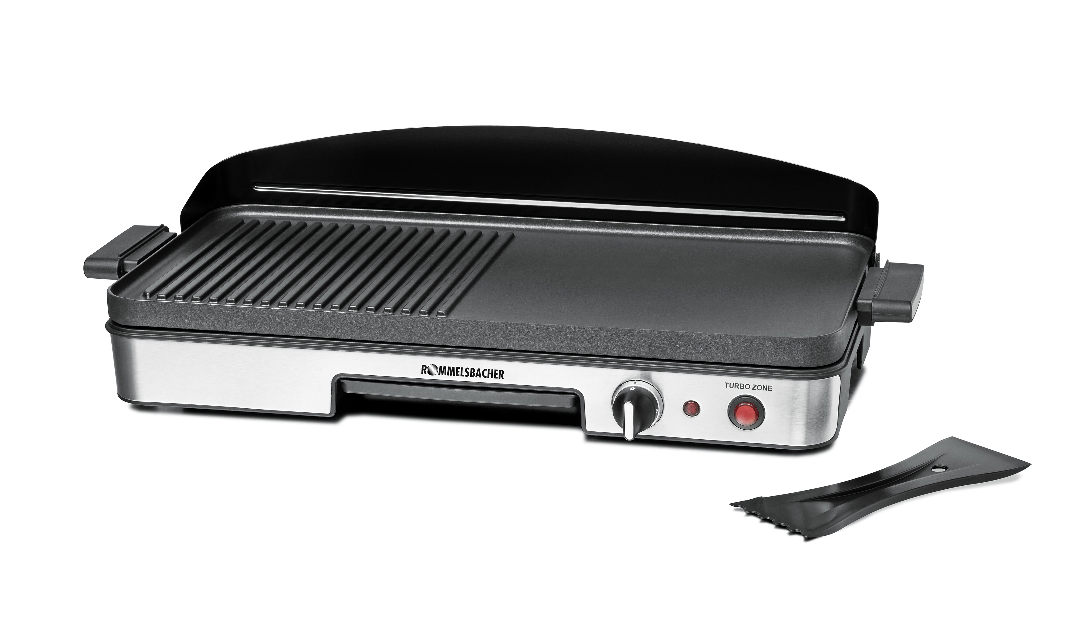 Ein schwarzer und silberner Grill mit Griff und Spatel.