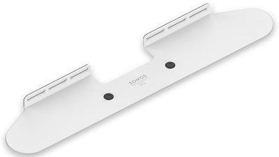 Support mural blanc pour barre de son Sonos. Il a une forme incurvée avec trous.