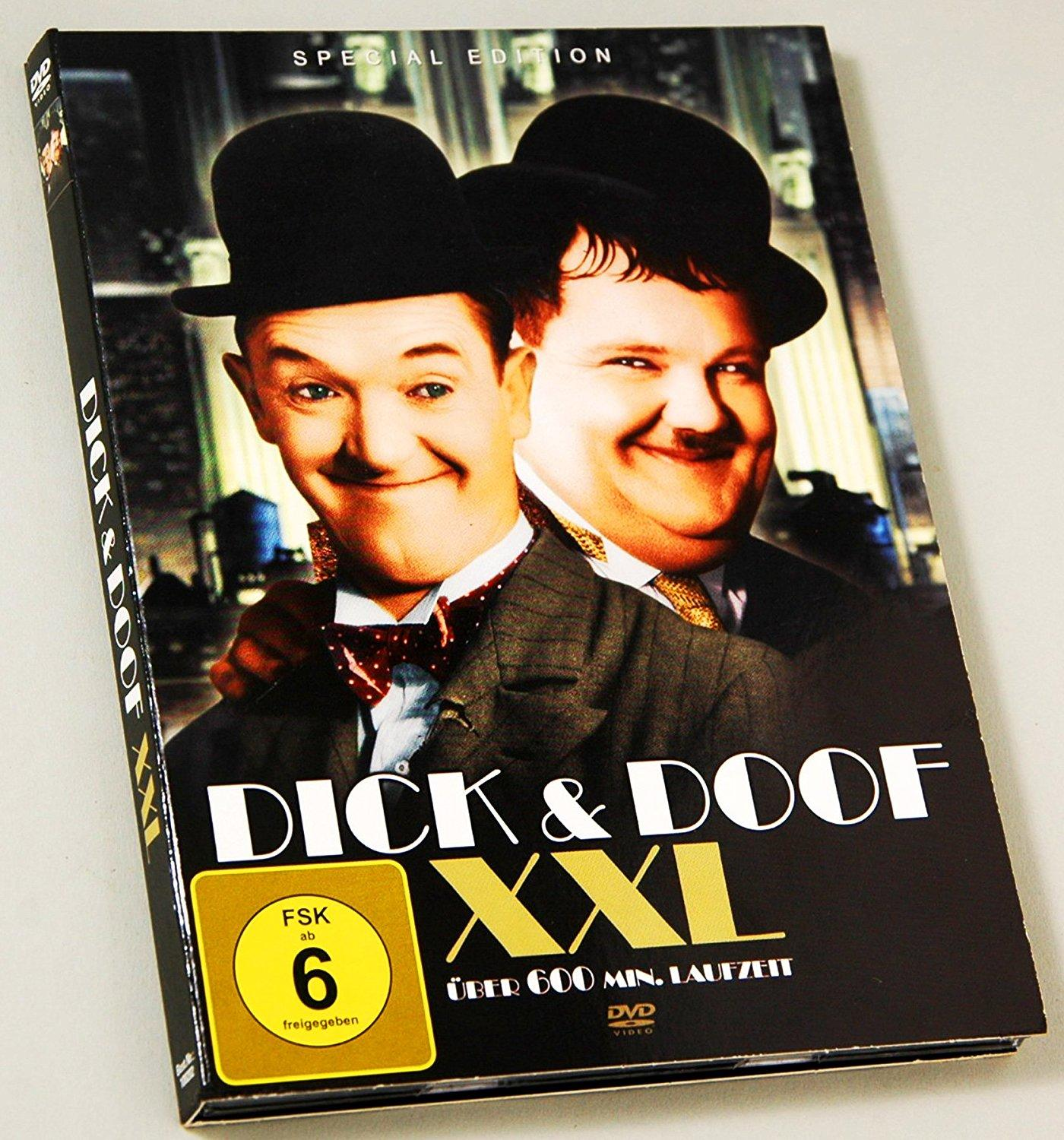 DVD-Cover: Dick & Doof, zwei Männer in Anzügen mit Hüten, lächelnd.