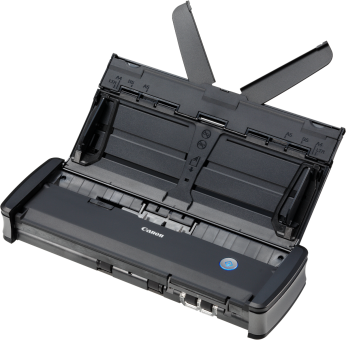 Scanner Canon, ouvert. Appareil noir avec couvercle ouvert, montrant les composants internes. Fond blanc.