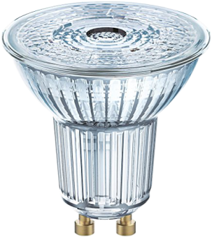 Une ampoule LED GU10. L'ampoule a une face en verre et des connecteurs dorés.