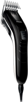 Une tondeuse à cheveux noire et blanche avec un protège-lame attaché.