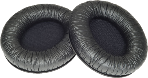 Deux coussinets d'oreille noirs. Ils sont ronds et ont une texture douce.