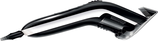 Tondeuse à cheveux électrique noire et argentée avec cordon noir sur fond sombre.