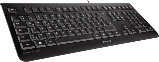 Un clavier noir Cherry KC 1000 avec des lettres et des chiffres blancs. Le clavier est incliné vers la droite, avec des touches visibles.