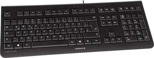 Un clavier noir Cherry KC 1000 est affiché en biais. Il a des lettres blanches et une connexion filaire.