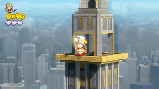 Toad avec un chapeau blanc au sommet d'un gratte-ciel. Pièces et gemmes Mario visibles.
