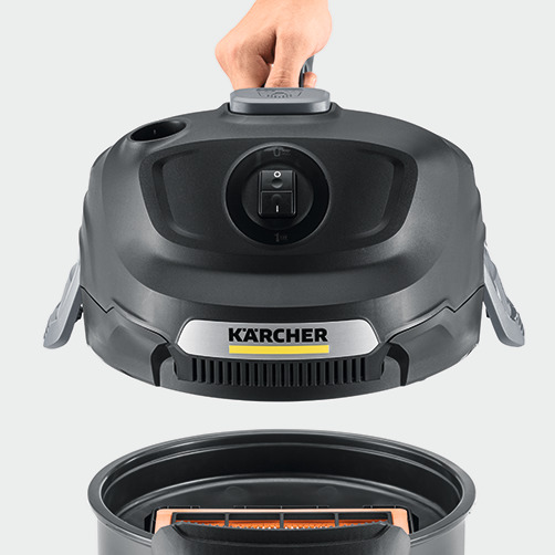 Oberteil eines Staubsaugers ohne Filter, Filter und Innenraum zeigend.