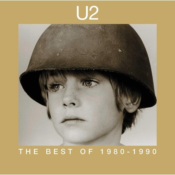 U2-Albumcover mit einem Jungen mit Helm, Text 'The Best Of 1980-1990'.