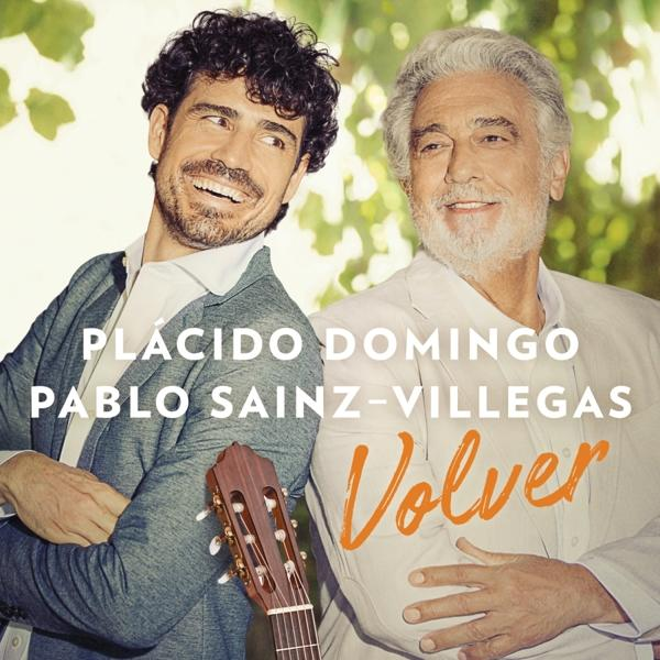 Albumcover mit zwei Männern, einer lächelnd, einer Gitarre spielend. Text lautet 'Placido Domingo, Pablo Sainz-Villegas, Volver'.