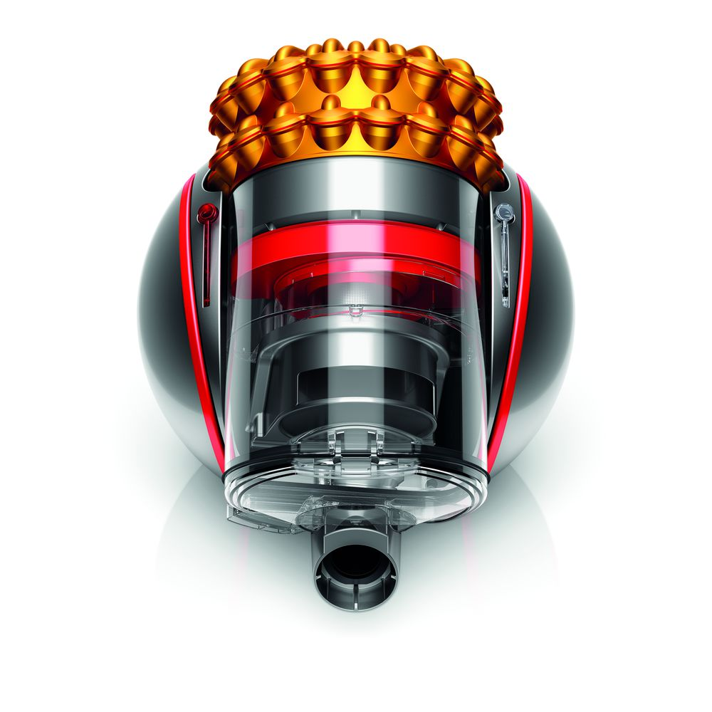 Een Dyson stofzuiger met een zilveren behuizing, rode accenten en een gouden bovenkant.