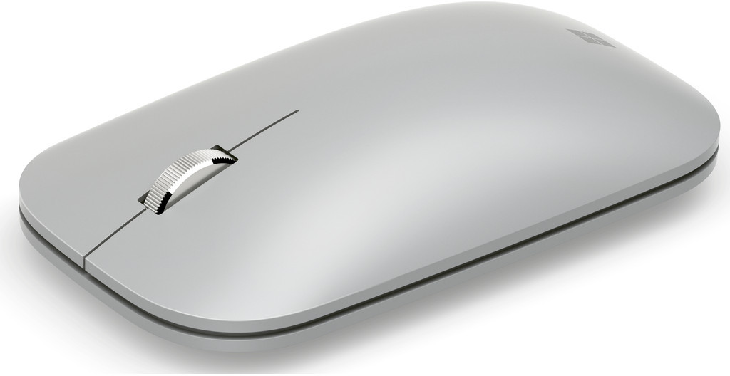 Zilveren Microsoft-muis met scrollwiel op een wit oppervlak.