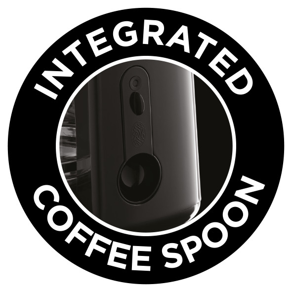 Nahaufnahme eines schwarzen Kaffeemaschinenteils mit den Worten 'INTEGRATED COFFEE SPOON' im Kreis.