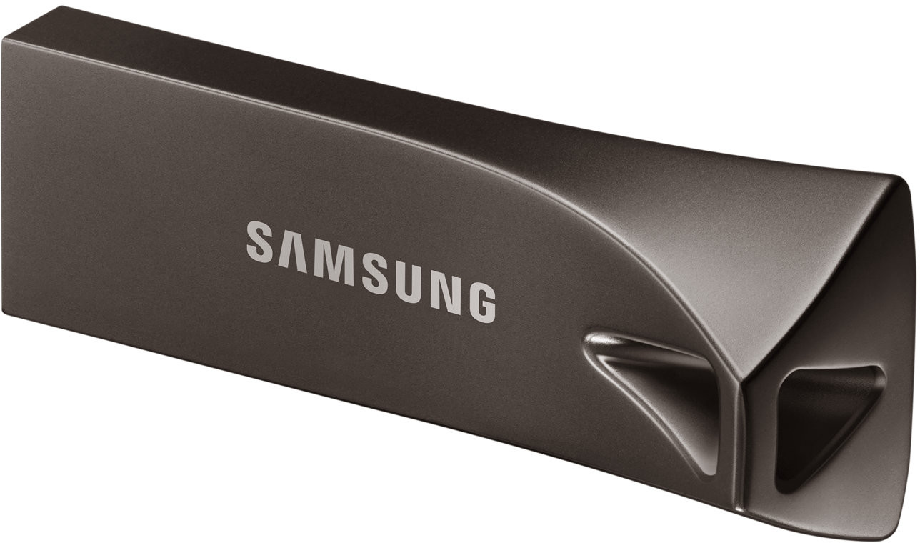 Dark grey USB drive with SAMSUNG logo, sleek design. Angular shape with a curved edge. White background.