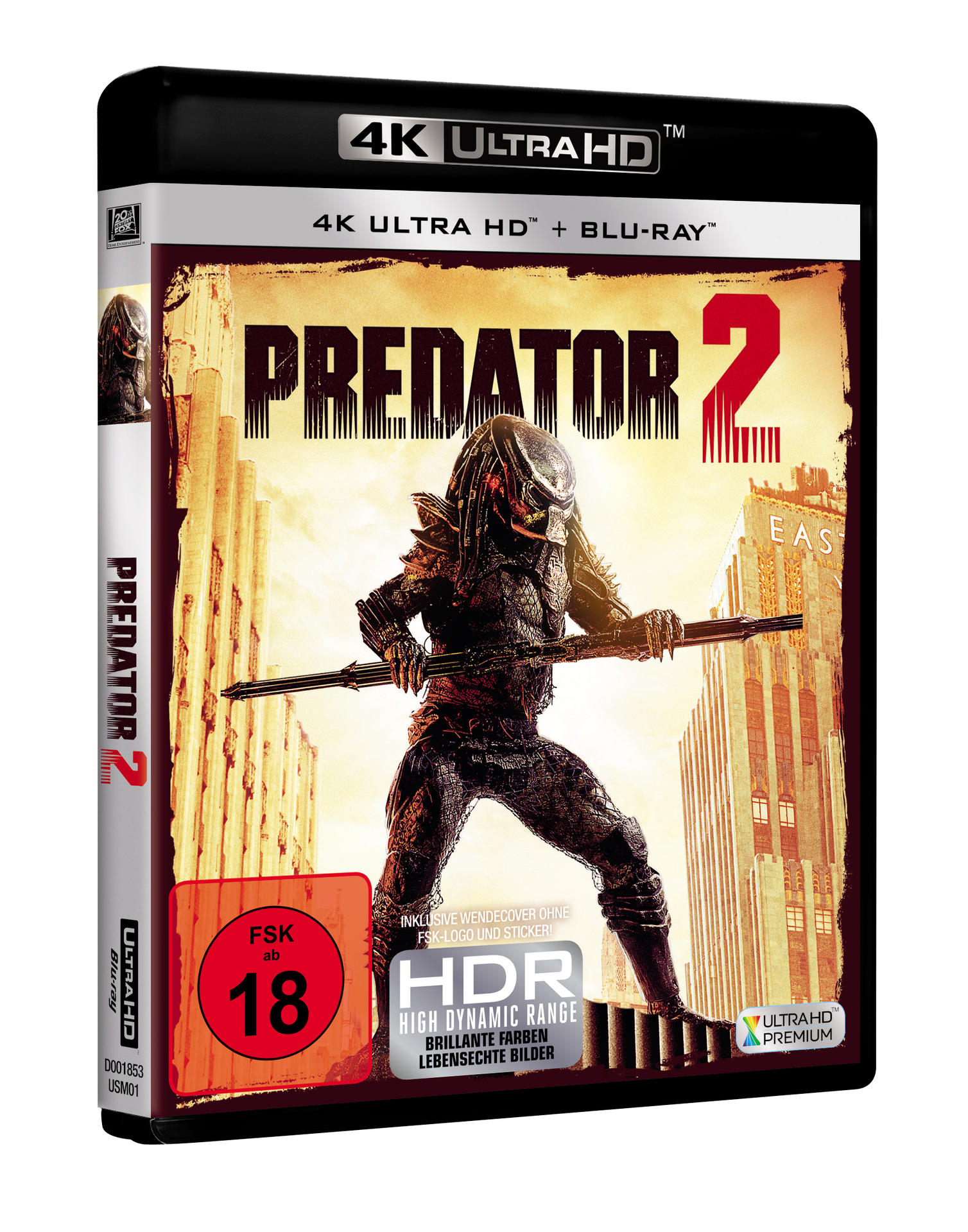 Predator 2 DVD-Hülle. Der Predator hält einen Speer. Stadt Hintergrund.