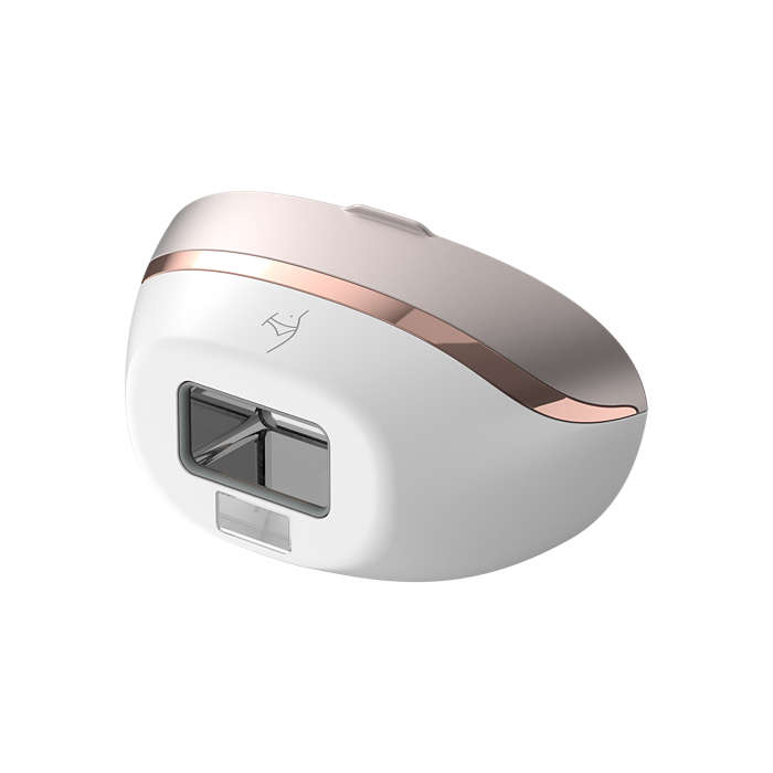 White and rose gold IPL hair removal device with a rectangular treatment window.