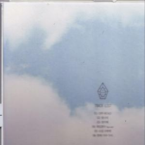 A CD cover with a cloudy sky and a logo, with text on the right side.