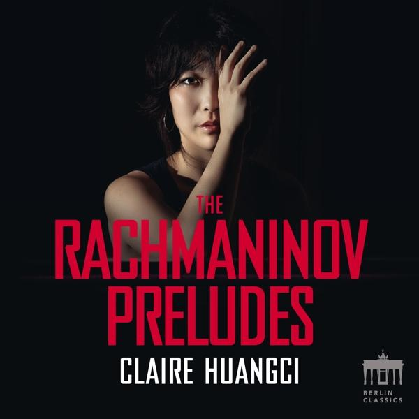 Albumcover mit einer Frau, die ihr halbes Gesicht mit der Hand bedeckt. Roter Text auf schwarzem Hintergrund.