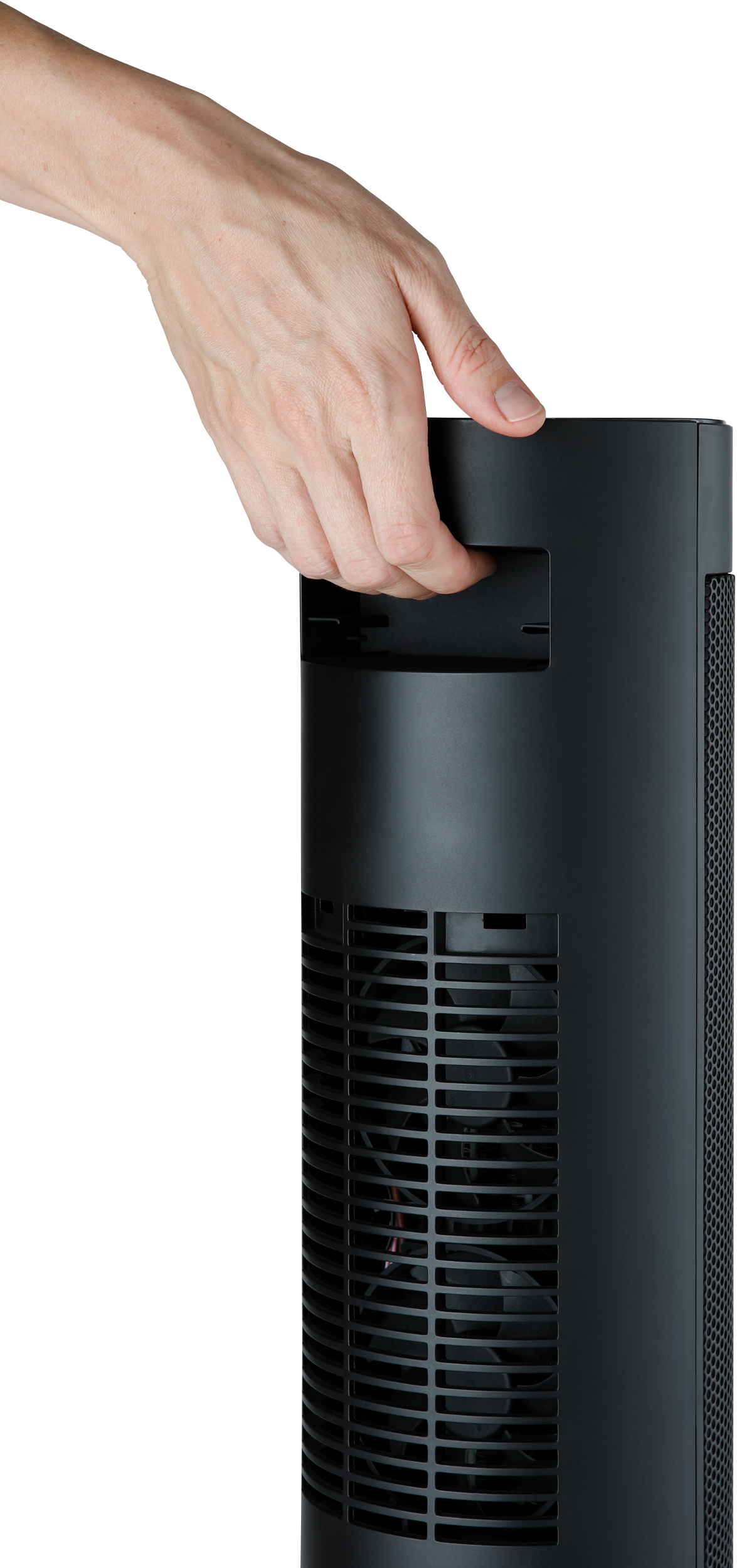 A hand holding a black tower fan. The fan has a handle on the top and vents.