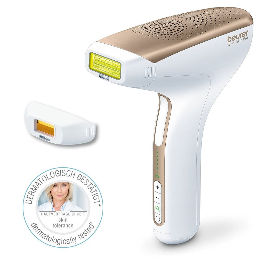 Weiß-goldenes Haarentfernungsgerät mit zusätzlichem Kopf und Frauenbild.