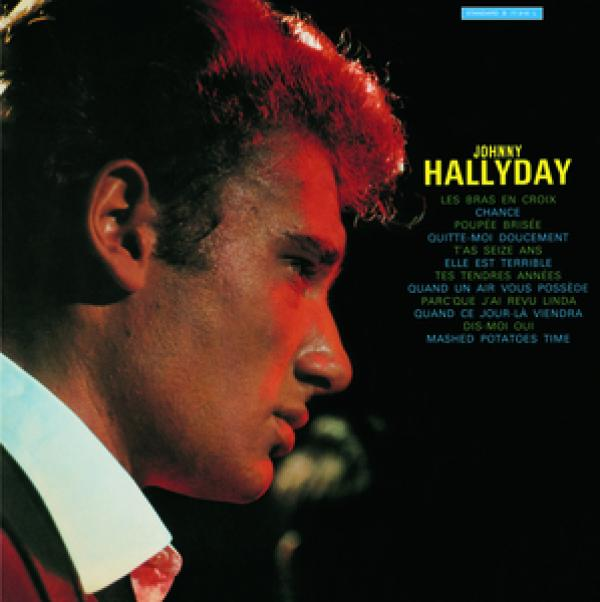 Album cover: a man with a profile shot, in a red and blue background.